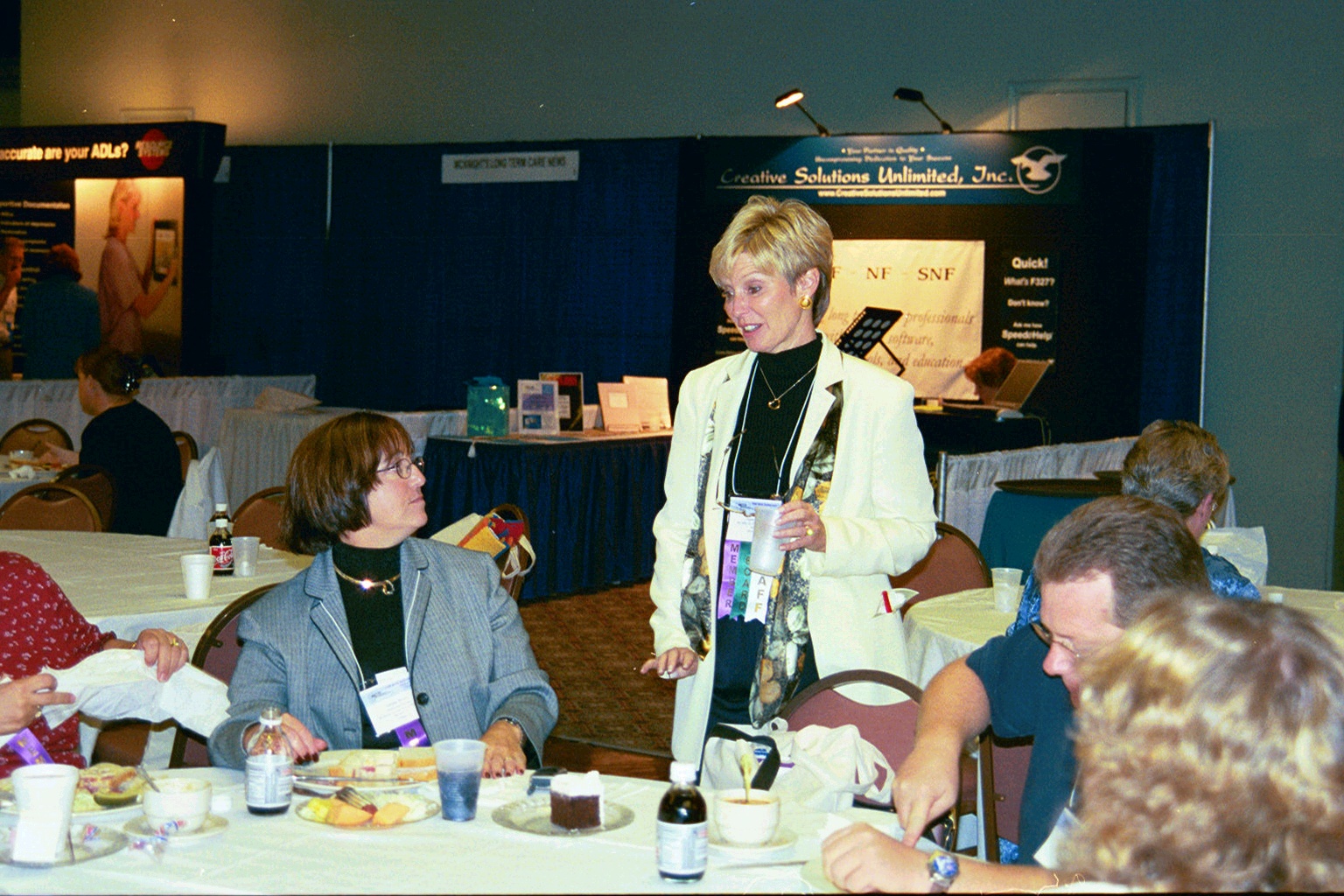 Diane Carter speaking with members at the Fall 2002 Conference in Chicago